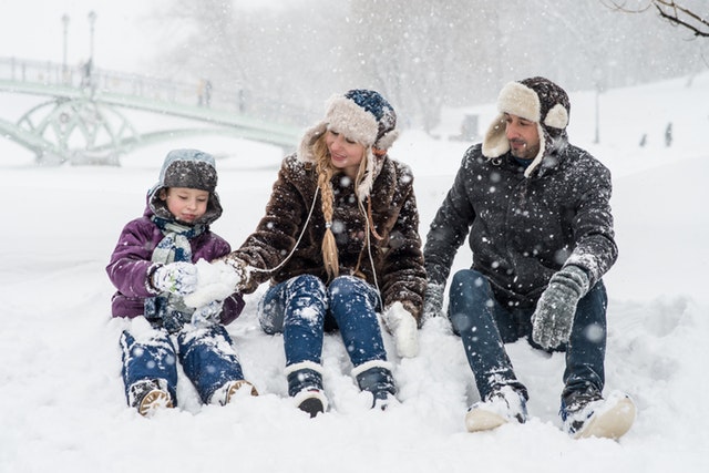 family in the snow by Victoria Boradinova from Pexels